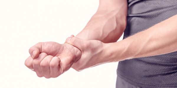 Maneiras de tratar a dor da mão e do punho em casa